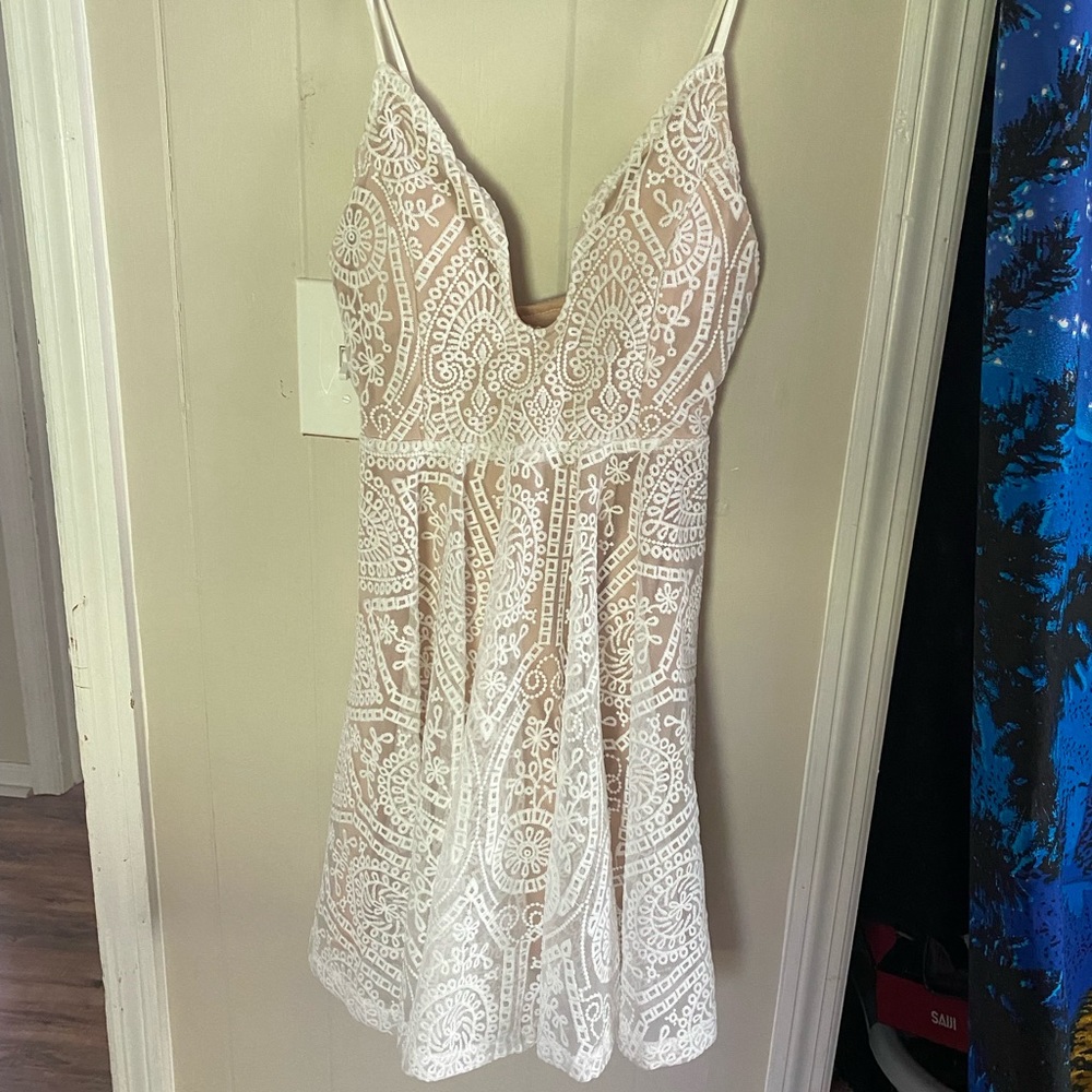 Lace overlay nude mini dress